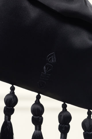 Signature Satin Tassel Wrist Bag